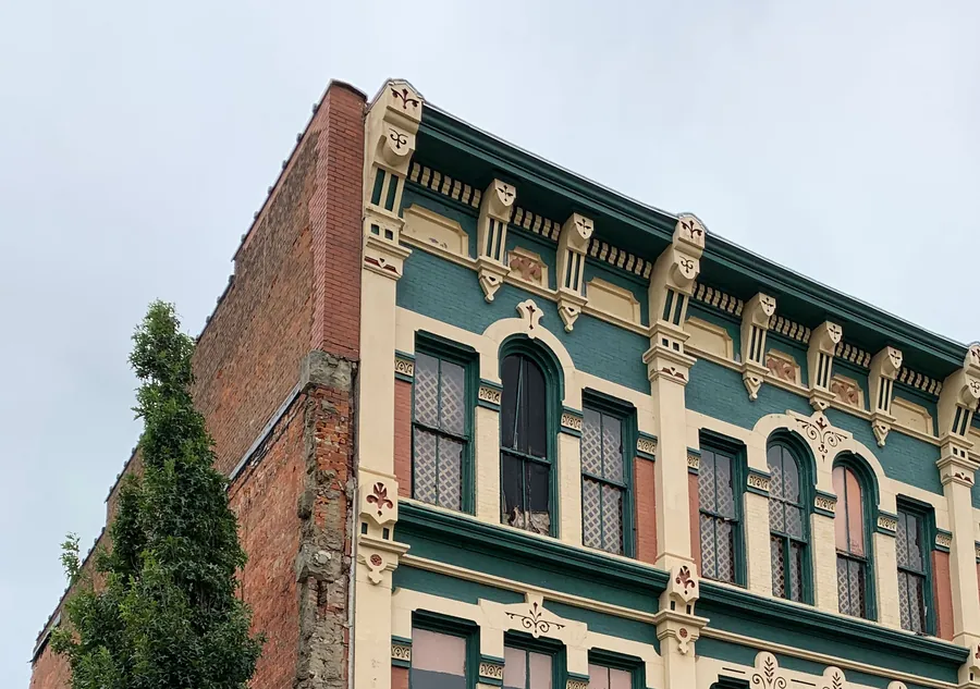 The restored Italianate cornice of The Downtown Exchange